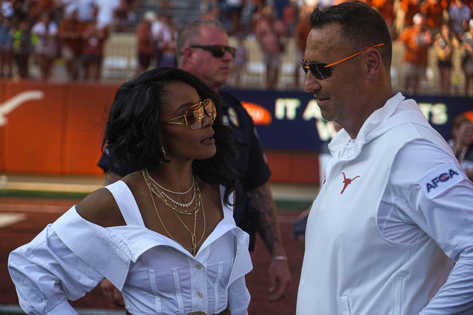 Texas Longhorns head coach Steve Sarkisian meets his wife Loreal Sarkisian after the 37-10 win over Rice at Royal-Memorial Stadium on Saturday, Sep. 2, 2023 in Austin.