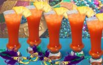 <p>You didn't think you'd get through a Mardi Gras recipe roundup without a stiff cocktail, did you? <a href="http://2cookinmamas.com" rel="nofollow noopener" target="_blank" data-ylk="slk:2 Cookin Mamas;elm:context_link;itc:0;sec:content-canvas" class="link "><b>2 Cookin Mamas</b></a> delivers with this fruity, fresh rum-based drink that will provide all the party you'll ever need.<br><br><a href="http://2cookinmamas.com/2014/04/08/its-a-hurricane/" rel="nofollow noopener" target="_blank" data-ylk="slk:For the Hurricane Cocktail recipe, click here.;elm:context_link;itc:0;sec:content-canvas" class="link "><b>For the Hurricane Cocktail recipe, click here.</b></a></p>