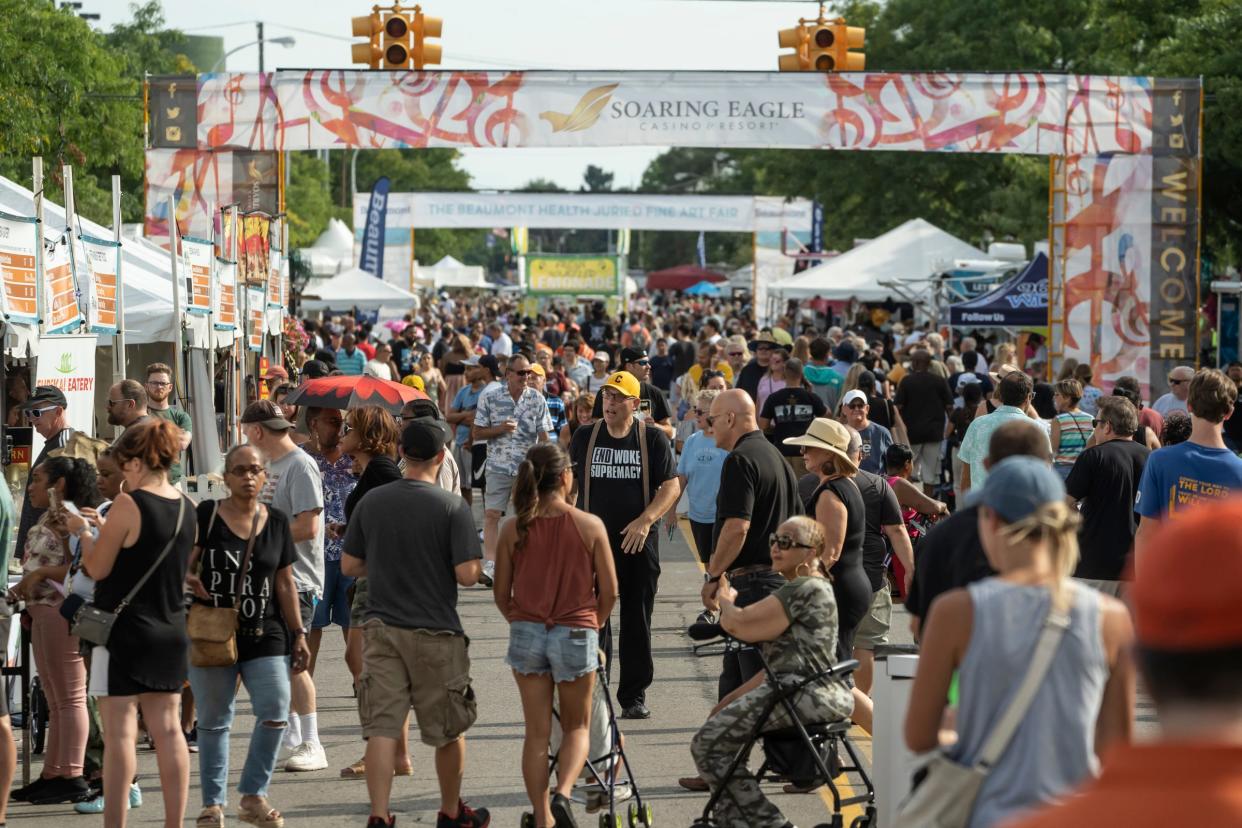 Crowds stroll down Washington Avenue during Arts, Beats & Eats in downtown Royal Oak on Sept. 2, 2022.