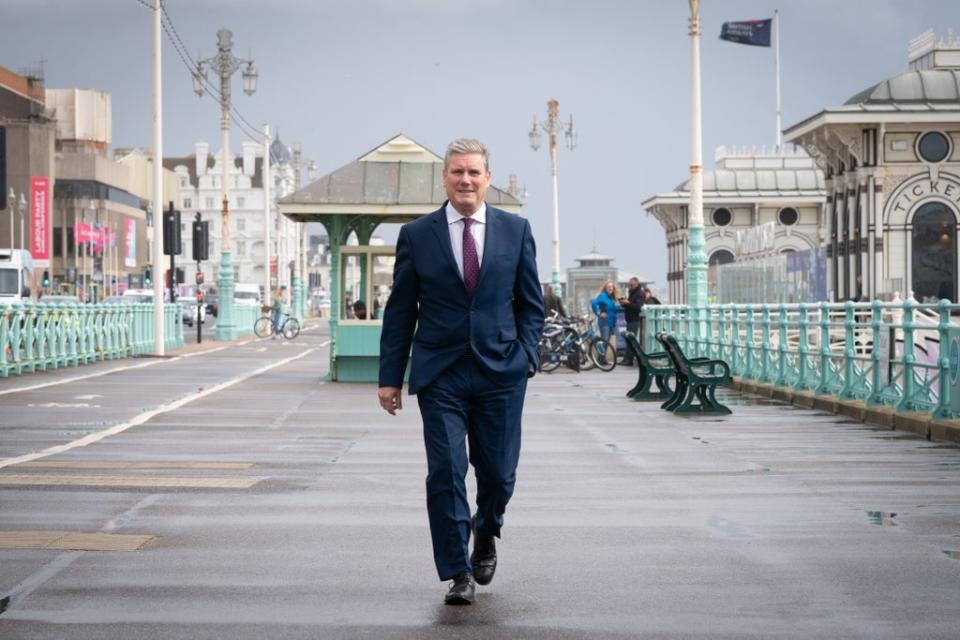 Labour leader Sir Keir Starmer walks along Brighton seafront promenade during the Labour Party conference (Stefan Rousseau/PA) (PA Wire)