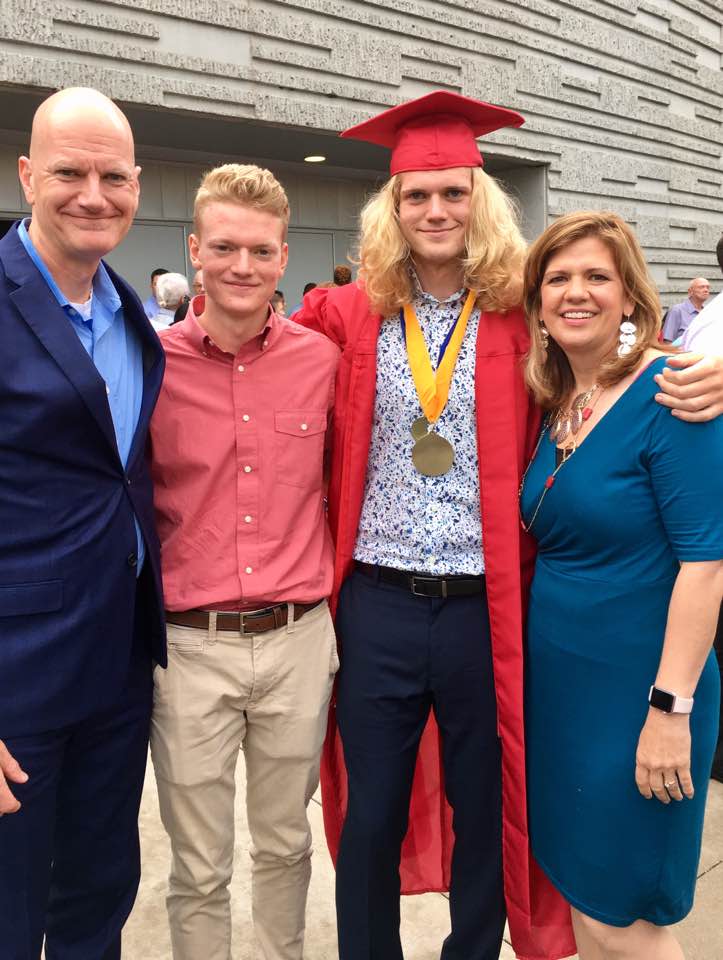 Mark Miller, far left, with sons Ethan and Luke and wife Kelly at Luke's graduation from Glendale High School.