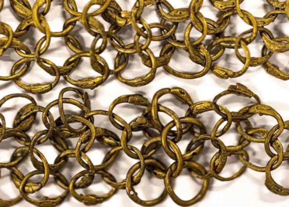 Ornamental border with riveted brass rings for a chainmail shirt (so-called hauberk) which was analyzed in connection with the dives. A chainmail of this quality can consist of up to 150,000 rings.<p>Rolf Warming/Stockholm University</p>