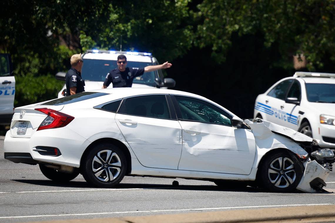 Charlotte-Mecklenburg Police respond to the scene of a multiple vehicle collision following a pursuit near the intersection of Ballantyne Commons Parkway and Johnston Road following a pursuit that started on Intestate 77 in Charlotte, N.C., Wednesday, July 6, 2022.