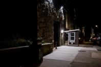 The Eastern State Penitentiary, a ballot drop box location for the upcoming presidential election, is illuminated at night in Philadelphia, Pennsylvania