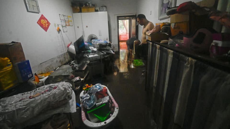 More than 52,000 people had to be evacuated from Beijing's Mentougou district as flood waters gushed into homes. - Pedro Pardo/AFP/Getty Images