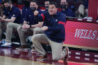 FILE - Arizona head coach Sean Miller gestures during an NCAA college basketball game against Southern California in Los Angeles, in this Saturday, Feb. 20, 2021, file photo. Arizona has parted ways with men's basketball coach Sean Miller as the program awaits its fate in an NCAA infractions investigation, a person with knowledge of the situation told The Associated Press. The person told the AP on condition of anonymity Wednesday, April 7, 2021, because no official announcement has been made. (AP Photo/Marcio Jose Sanchez, File)