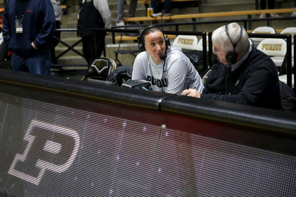 Purdue head coach Katie Gearlds talks with Purdue radio announcer Tim Newton after Purdue defeated Penn State, 81-77, Wednesday, Feb. 9, 2022 at Mackey Arena in West Lafayette.