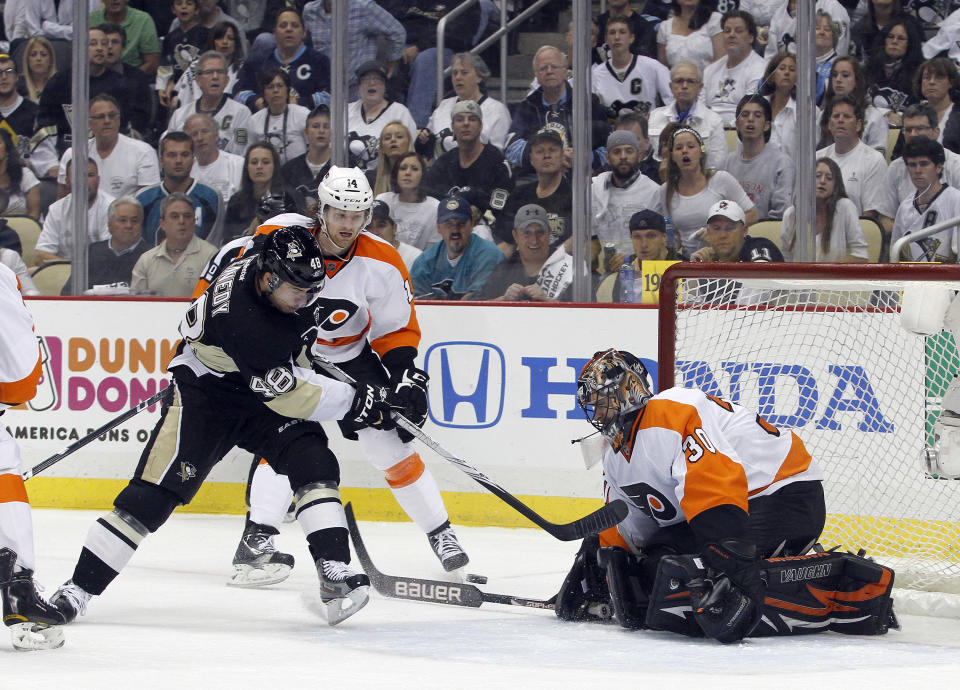 PITTSBURGH, PA - APRIL 20: Ilya Bryzgalov #30 of the Philadelphia Flyers makes a save on Tyler Kennedy #48 of the Pittsburgh Penguins in Game Five of the Eastern Conference Quarterfinals during the 2012 NHL Stanley Cup Playoffs at Consol Energy Center on April 20, 2012 in Pittsburgh, Pennsylvania. (Photo by Justin K. Aller/Getty Images)