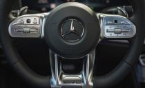 <p>The front of the E coupe's ritzy interior mostly carries over from the sedan and wagon, with the AMG adding plenty of classy details.</p>