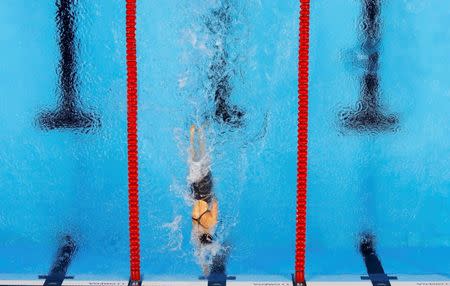 Katie Ledecky competes on the way to winning the gold medal and setting a new world record. REUTERS/Athit Perawongmetha