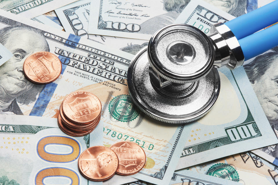 Stethoscope on money background. medical concept. Close up