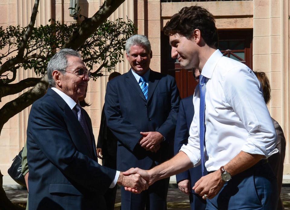 A beaming Miguel Diaz-Canel looks on as Canada's Justin Trudeau shakes hands with Raul Castro in Havana on Nov. 16, 2016. Castro introduced Trudeau to the man who would replace him as president two years later.