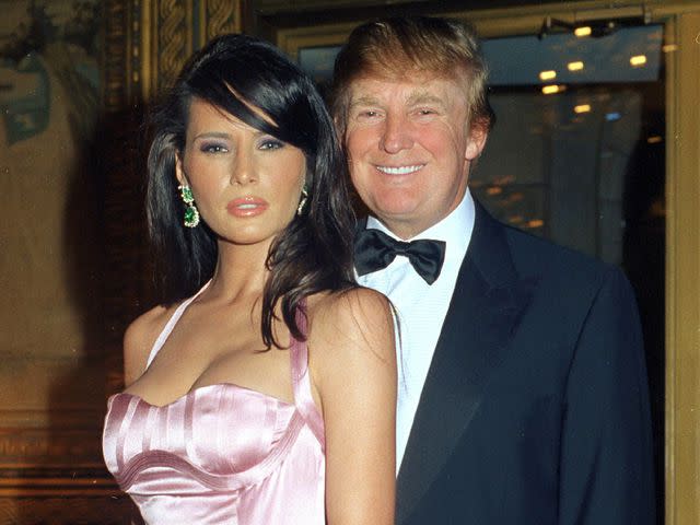 <p>Davidoff Studios Photography/Getty</p> Melania Knauss and Donald Trump during a New Year's Eve party at the Mar-a-Lago estate in Palm Beach, Florida on December 31, 2002.