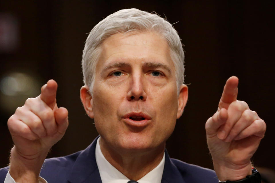 FILE PHOTO - U.S. Supreme Court nominee judge Neil Gorsuch testifies during a third day of his Senate Judiciary Committee confirmation hearing on Capitol Hill in Washington, U.S., March 22, 2017. REUTERS/Jonathan Ernst/File Photo