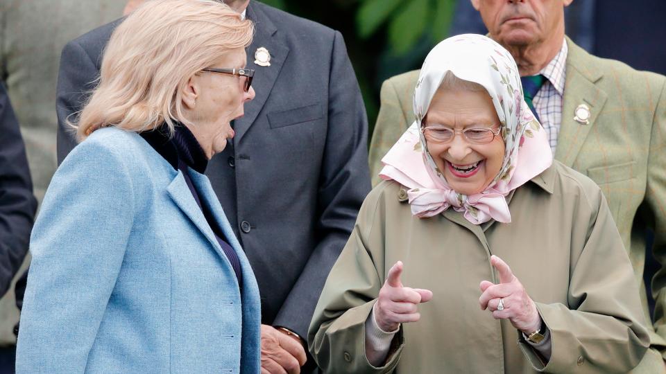 Queen Elizabeth II (r) watches her horse 'Balmoral Angel' compete in the Highland Class on day 3 of the Royal Windsor Horse Show in Home Park on May 12, 2017 in Windsor, England.