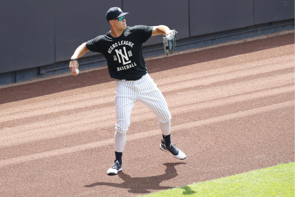 New York Yankees right fielder Aaron Judge throws from the outfield during baseball practice, Wednesday, July 15, 2020, at Yankee Stadium in New York. Judge was back on the field after suffering from a stiff neck. (AP Photo/Kathy Willens)