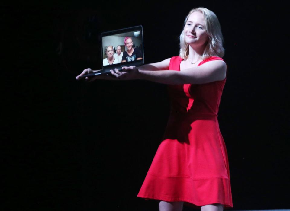 <span class="caption">Brittany Winner holding up a Zoom call of her sister, Reality Winner, watching the premiere of "Is This A Room?"</span><span class="photo-credit">Bruce Glikas - Getty Images</span>