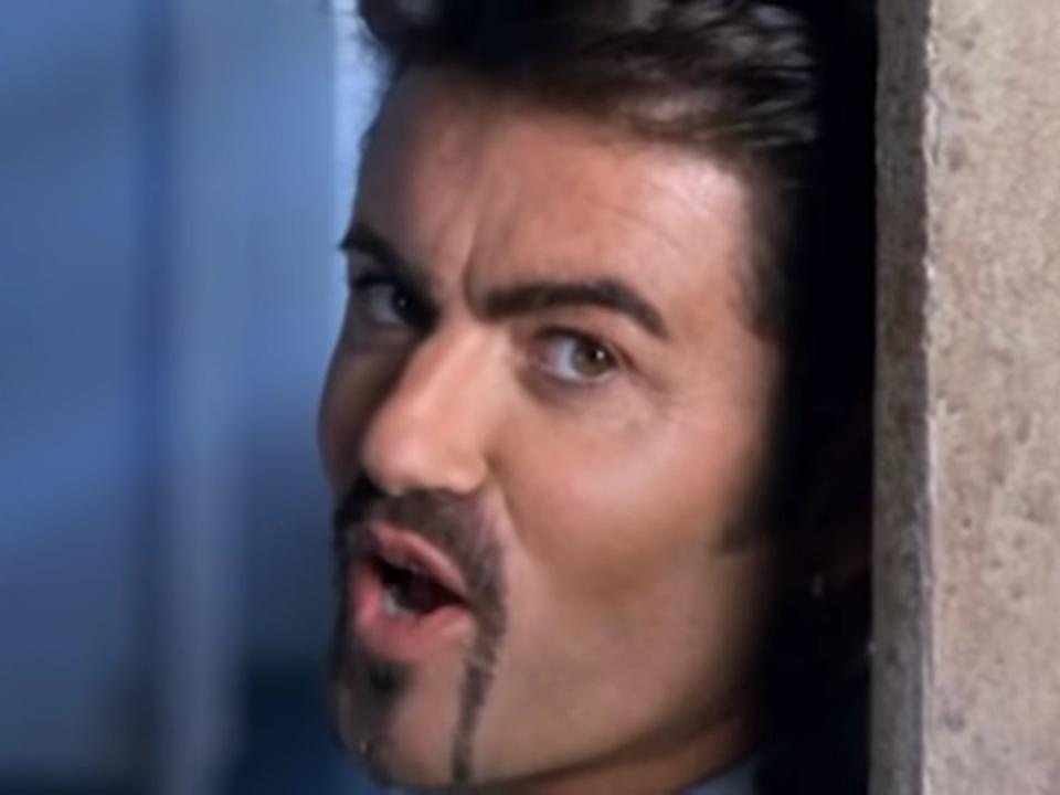 George Michael in the music video for ‘Outside’ (George Michael/YouTube)