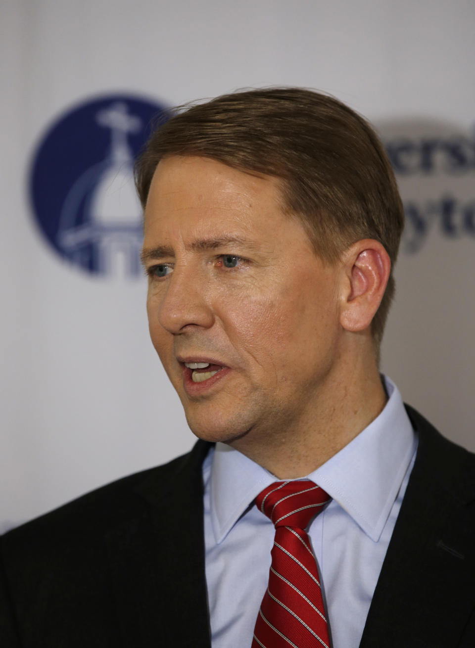 Ohio Democratic gubernatorial candidate Richard Cordray is photographed in the spin room following a debate against Ohio Attorney General and Republican gubernatorial candidate Mike DeWine at the University of Dayton Wednesday, Sept. 19, 2018, in Dayton, Ohio. (AP Photo/Gary Landers)