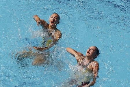 2016 Rio Olympics - Synchronised Swimming - Preliminary - Duets Technical Routine - Maria Lenk Aquatics Centre - Rio de Janeiro, Brazil - 15/08/2016. Katie Clark (GBR) of Britain and Olivia Federici (GBR) of Britain compete. REUTERS/Athit