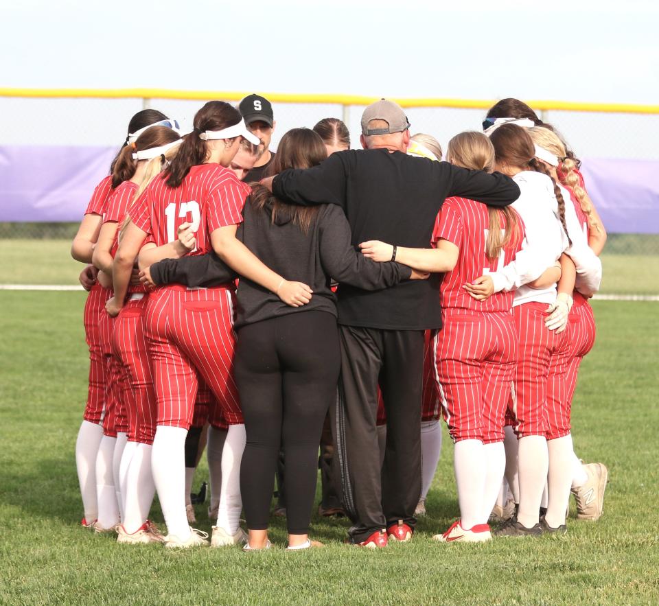 Sheridan huddles together after a 6-1 win over West Muskingum on Tuesday. It was the 17th straight win by the Generals, which also gave coach Mark Paxton his 400th career victory.