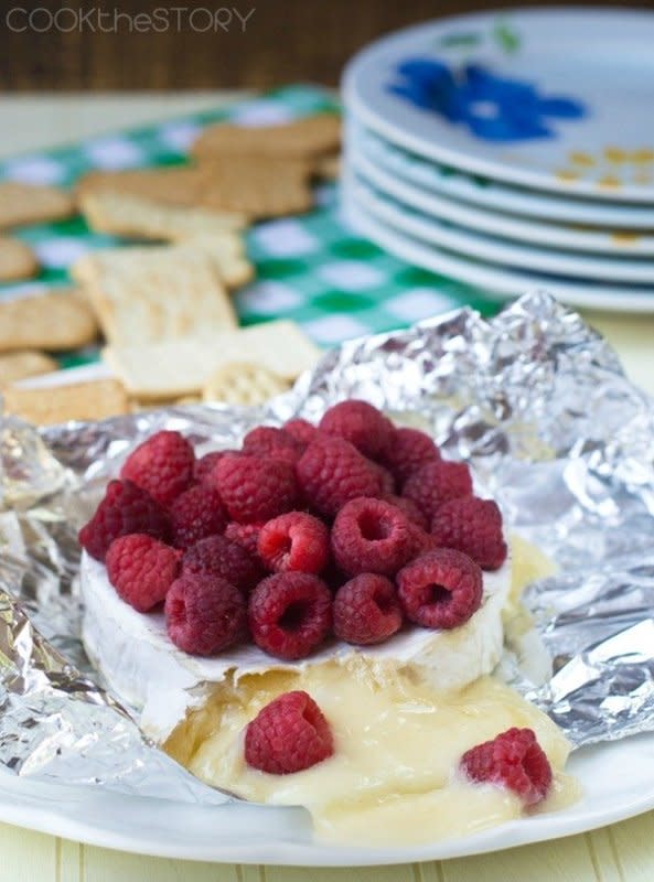 <p>Cook the Story</p><p>So simple and so many ways to change it up with your favorite berries.</p><p><strong>Get the recipe: <a href="http://www.cookthestory.com/2014/07/14/grilled-raspberry-brie/?v=2" rel="nofollow noopener" target="_blank" data-ylk="slk:Brie Cheese with Raspberries;elm:context_link;itc:0;sec:content-canvas" class="link ">Brie Cheese with Raspberries</a></strong></p>