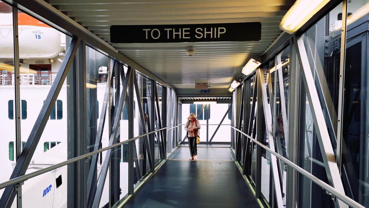 Southampton, UK: August 24, 2018: Passengers board on ocean liner docked at port.