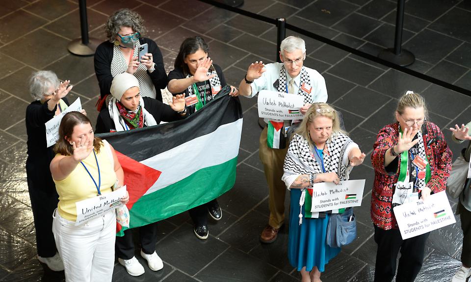 This is the UMC General Conference at the Charlotte Convention Center on April 30, 2024. During the conference, a peaceful silent protest in support Palestine was held at the convention center. College students and others took part in the protest.