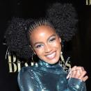 Ebonee Davis is a reliable source for natural hair inspiration, and oh, look, here she is again with another hairstyle we'd like to copy. The model/activist stepped out on the red carpet with a set of gorgeous Afro puffs, boasting a base of tiny cornrows braided in three directions.
