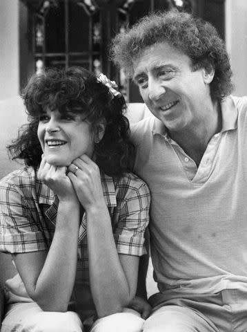 <p>Ted Dully/The Boston Globe via Getty</p> Gilda Radner and Gene Wilder during a 1984 interview.