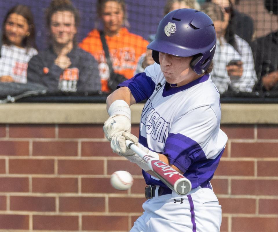 Jackson’s Eric Freetage drives in a run during the first inning against Hoover in a Division I sectional final, Thursday, May 18, 2023.