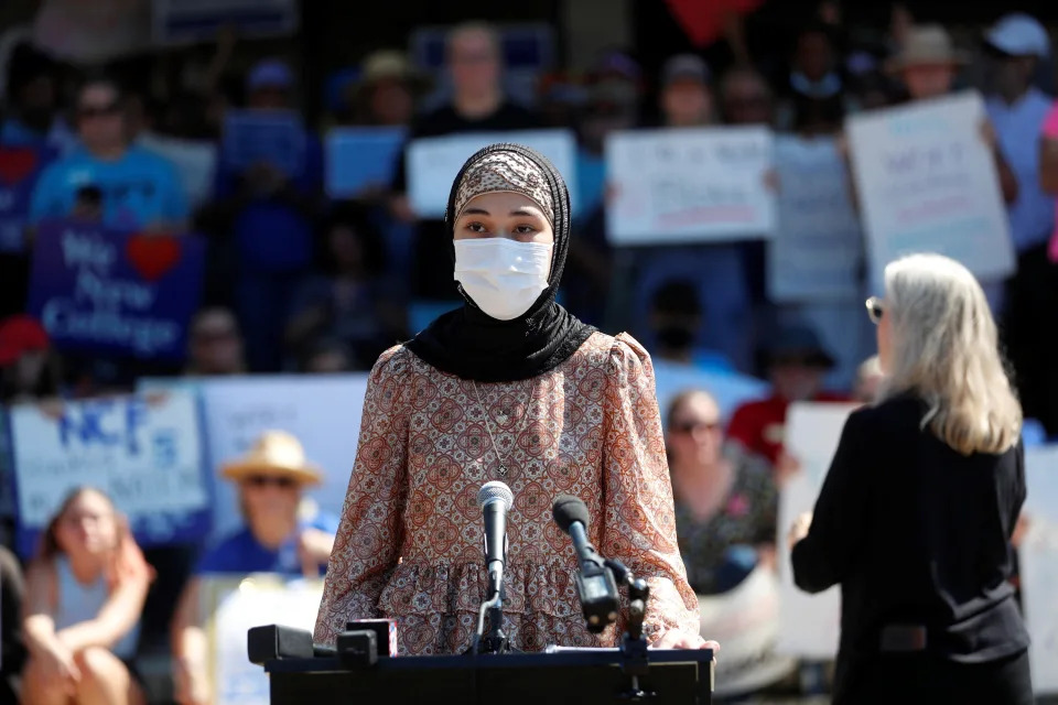 New College of Florida student Fatima Ismatulla speaks during a rally at the New College of Florida, where students staged a walkout from the public liberal arts college to protest against a proposed wide-reaching legislation that would ban gender studies majors and diversity programs at Florida universities, in Sarasota, Florida, U.S. February 28, 2023 .  REUTERS/Octavio Jones