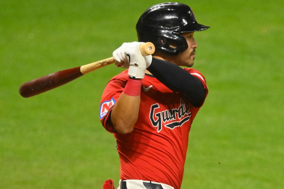 Cleveland Guardians' Steven Kwan (38) singles against the Cincinnati Reds on Sept. 24 in Cleveland.