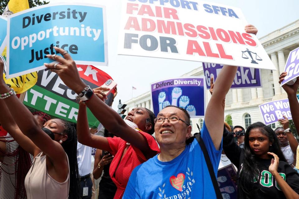 Demonstrators for and against the U.S. Supreme Court decision to strike down race-conscious student admissions programs at Harvard University and the University of North Carolina confront each other, in Washington, US, June 29, 2023 (REUTERS)