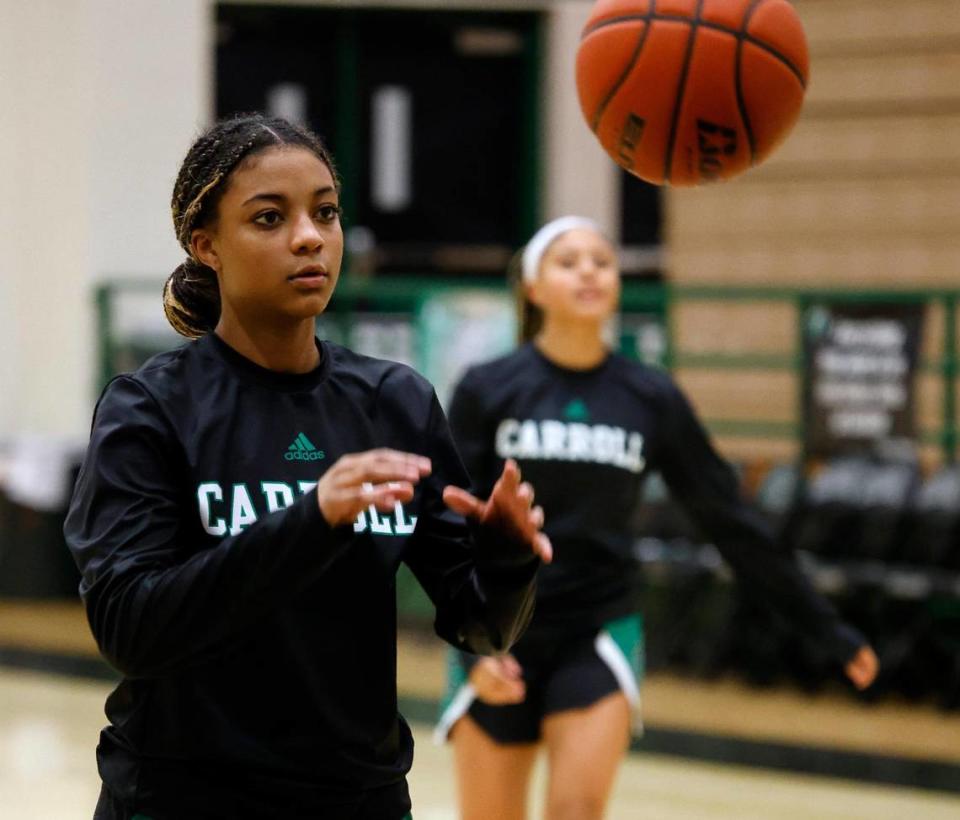 Natalia Jordan prepares to shoot free throws with sister Gianna in the background during basketball practice at Southlake Sr. High School in Southlake, Texas, Tuesday, Feb. 06, 2024.