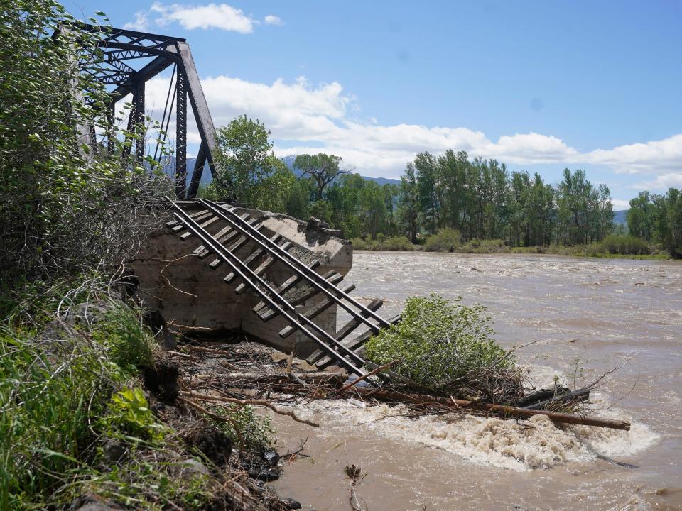 train tracks bridge fallen into yellowstone river