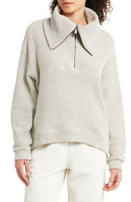 A half-zip pullover featuring a weighted fabric