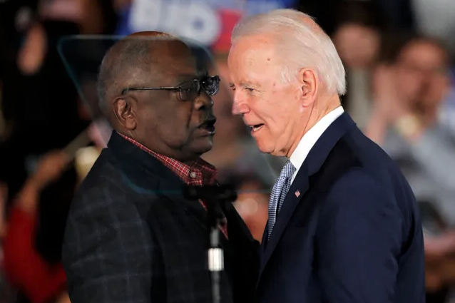 Then-presidential candidate Joe Biden meets with U.S. Rep. James Clyburn, D-SC, at a campaign stop in Columbia in February 2020.