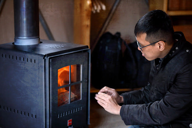 Light a fire with a low-emission wood stove.