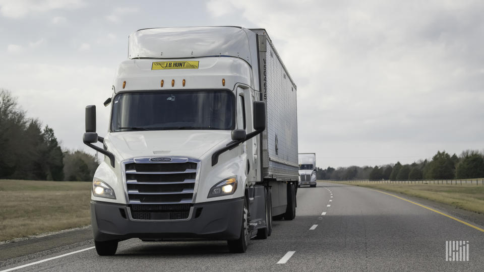 A J.B. Hunt tractor-trailer on a highway