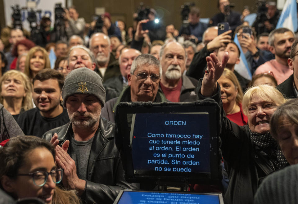 Supporters stand to a teleprompter as they listen to Presidential hopeful Patricia Bullrich, with the United for Change coalition, during a rally in Buenos Aires, Argentina, Monday, Aug. 7, 2023. Primary elections for all parties in Argentina are set for Aug. 13. (AP Photo/Rodrigo Abd)