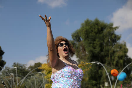 A participant takes part in Jerusalem's 17th annual Gay Pride Parade August 2, 2018. REUTERS/Ammar Awad