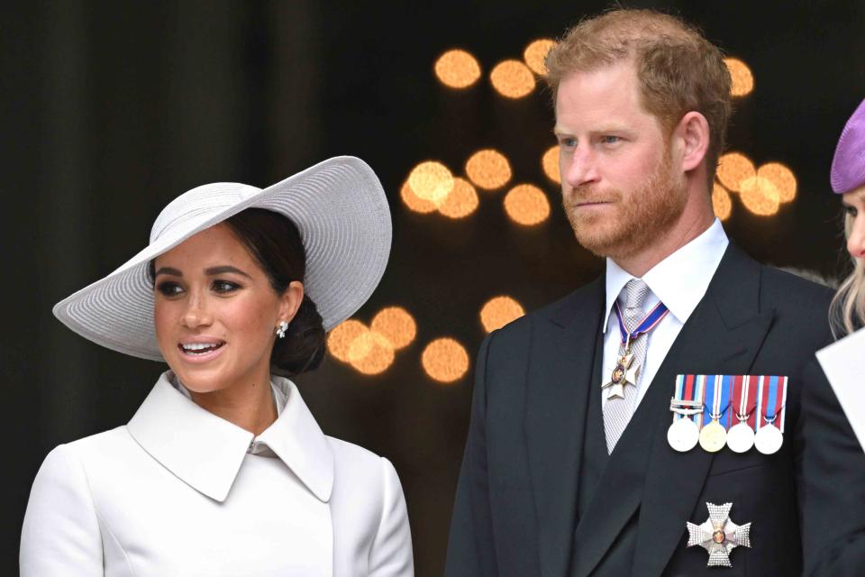 <p>Karwai Tang/WireImage</p> Meghan Markle and Prince Harry