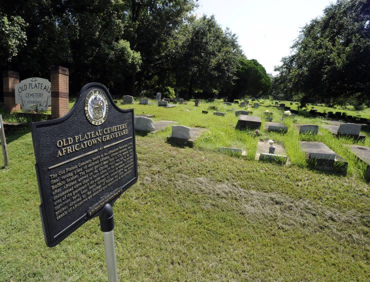 The Old Plateau Cemetery Africatown Graveyard holds remains of the Africans who were brought to the U.S. aboard the slave ship Clotilda in 1860, in Mobile, Ala. - Credit: AP Photo/Jay Reeves