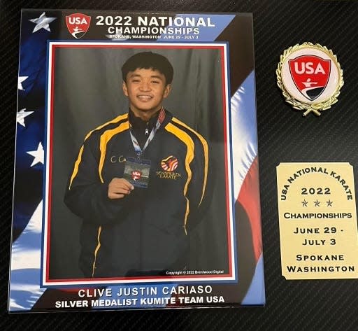 A plaque showcasing Clive Justin Cariaso after the award ceremony at the 2022 USA National Karate Championship.