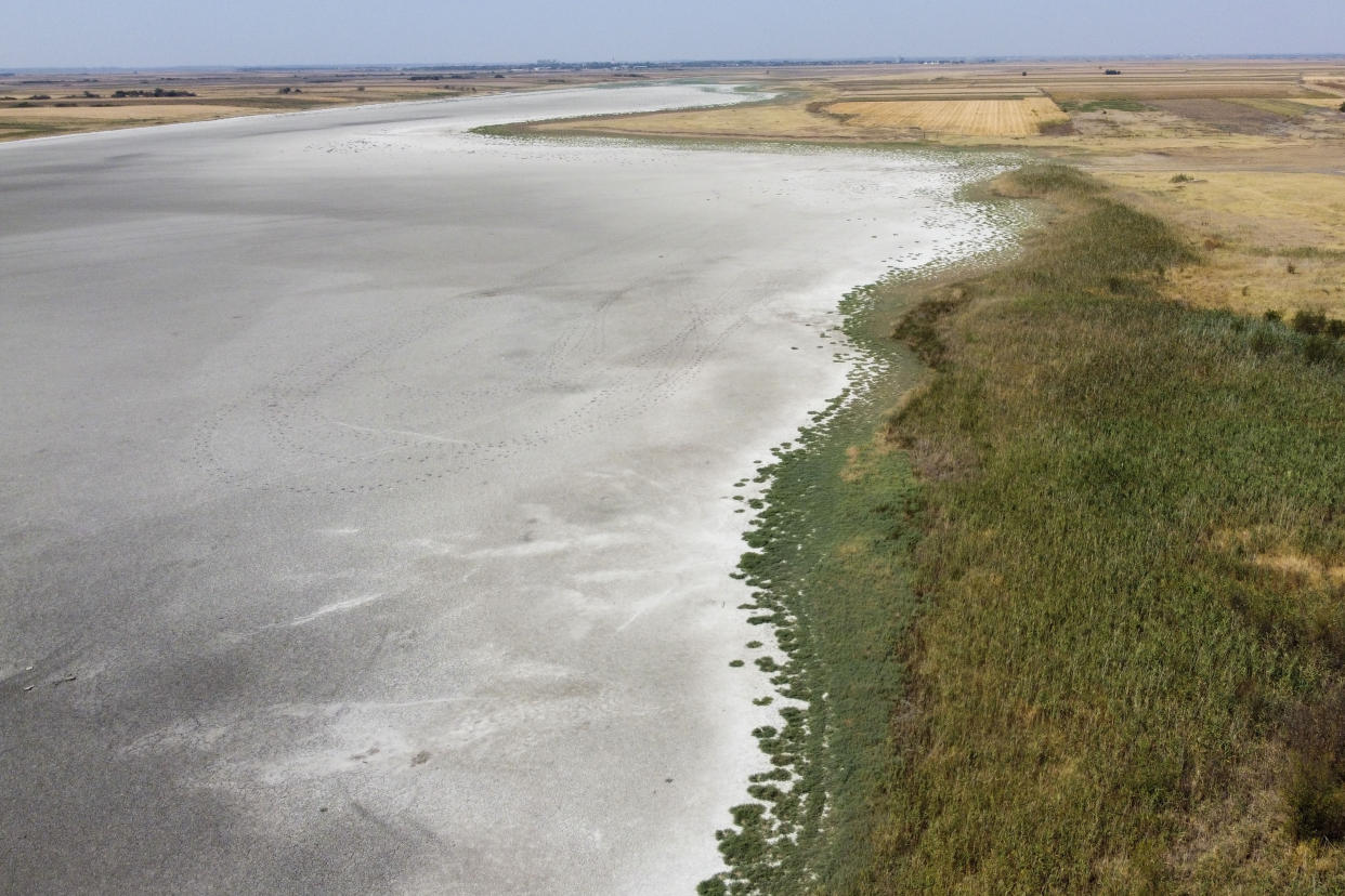 The dried up Rusanda salty lake, of which its mud is used in medical therapy, near Melenci, Serbia, Wednesday, Sept. 4, 2024. Experts say the summer of 2024 in the Balkans was the hottest since measurements started more than 130 years ago. (AP Photo/Darko Vojinovic)