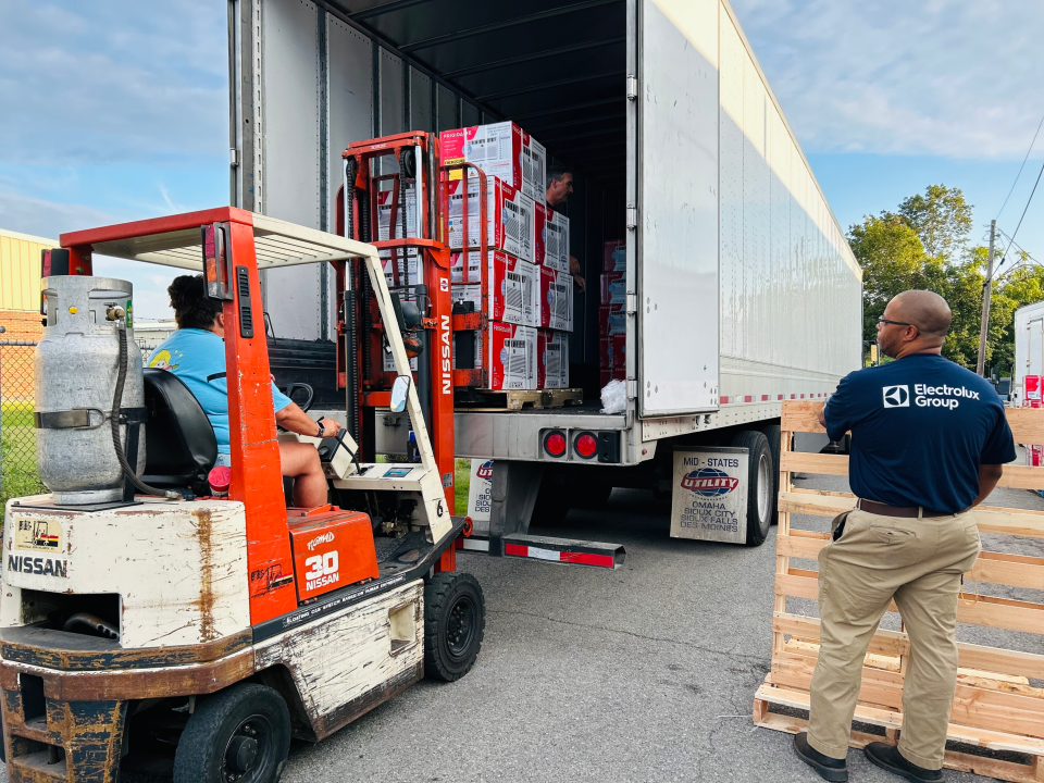 Electrolux Group employees from the Springfield manufacturing factory unloaded the room air conditioners off an 18-wheeler truck at TNKids Nutrition, Inc. at 1006 Pepper St in Springfield.