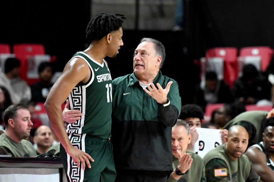 Michigan State head coach Tom Izzo talks with guard A.J. Hoggard during the first half against the Maryland Terrapins at Xfinity Center on Sunday, Jan. 21, 2024 in College Park, Maryland.