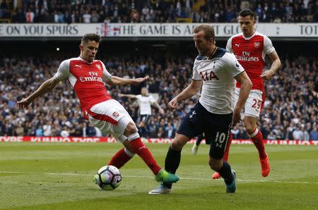 Britain Football Soccer - Tottenham Hotspur v Arsenal - Premier League - White Hart Lane - 30/4/17 Tottenham's Harry Kane is brought down by Arsenal's Gabriel Paulista for a penalty Action Images via Reuters / Paul Childs Livepic