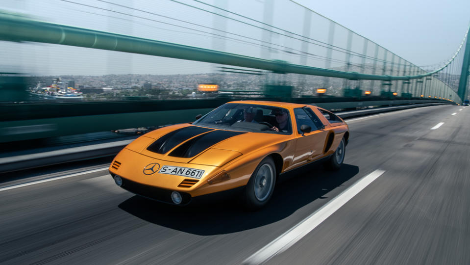 Dressed in orange-metallic paint known as “weissherbst,” the 1970 Mercedes-Benz C111, commands attention on the roads of Long Beach, Calif. - Credit: Robin Trajano, courtesy of Mercedes-Benz.